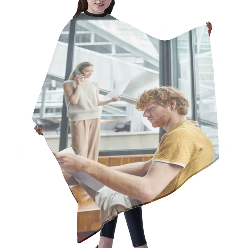 Personality  Red Hair Man Looking At Documents And His Colleague Talking On Phone On Backdrop, Coworking Concept Hair Cutting Cape