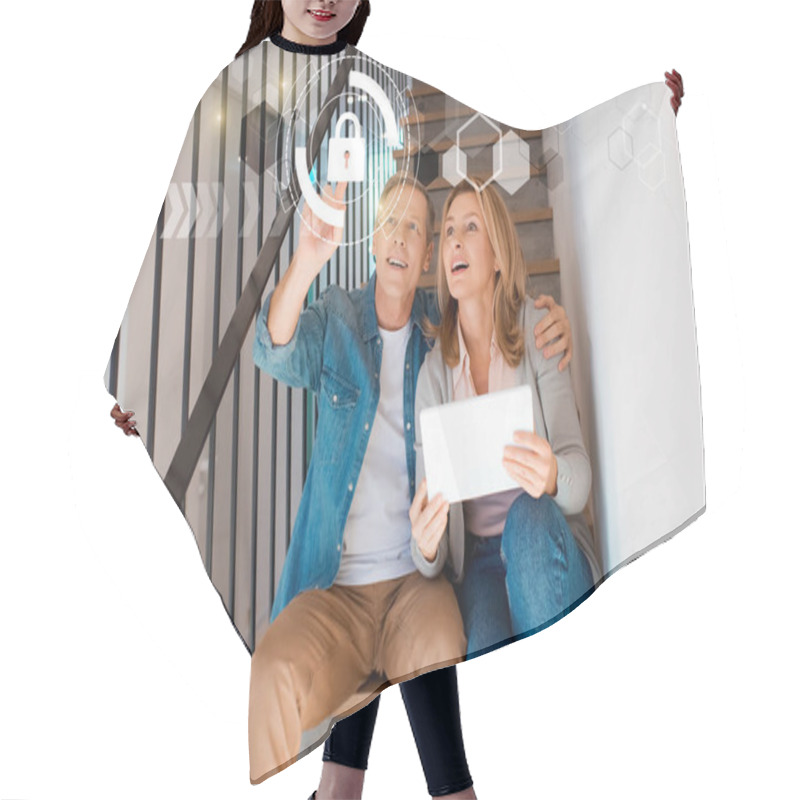 Personality  Smiling Man Pointing Hand And Wife Holding Digital Tablet While Sitting On Stairs, Smart Home Concept Hair Cutting Cape