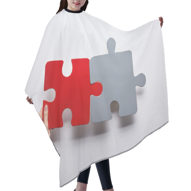 Personality  Top View Of Red And Grey Puzzles Problem Solution Symbol On Grey Background  Hair Cutting Cape