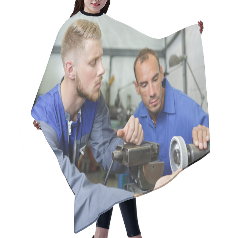 Personality  Two Male Engineers Working Together On Machinery Hair Cutting Cape