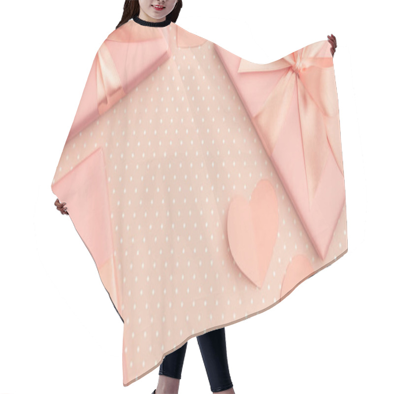 Personality  Valentine Day Idea Composition: Pink Or Coral Present Box With Ribbon And Small Hearts On Living Coral Background. Top View. Flat Lay Hair Cutting Cape