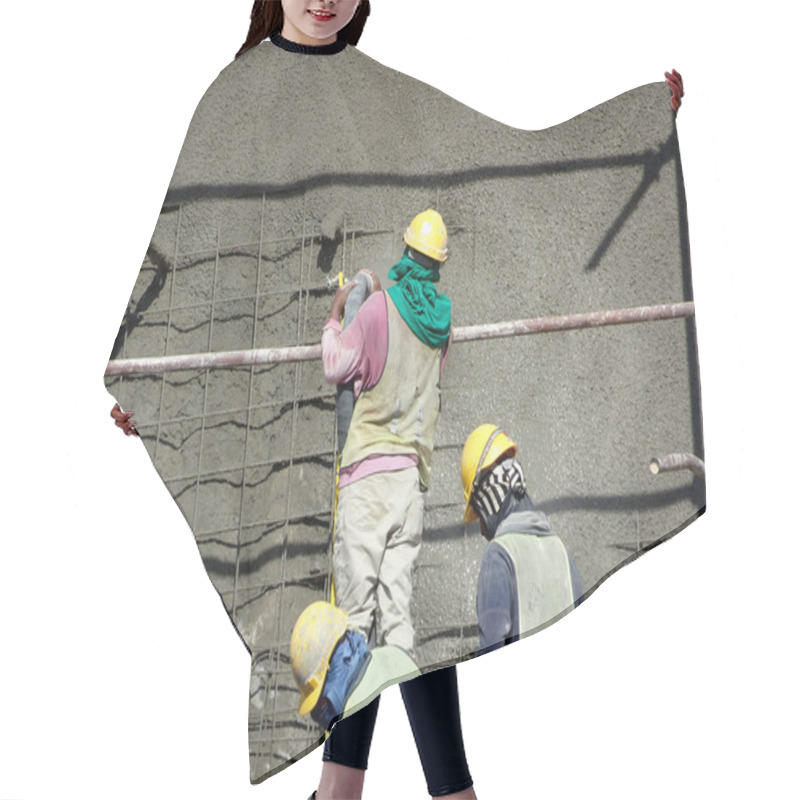 Personality  SELANGOR, MALAYSIA -MARCH 4: Construction Workers Are Spraying Liquid Concrete Onto The Slope Surface To Form A Retaining Wall Layer. It Acts To Prevent Erosion On The Slope Surface. Hair Cutting Cape