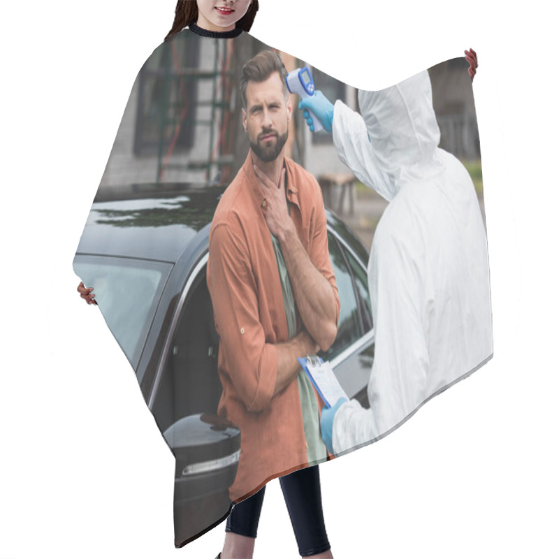 Personality  Ill Driver Standing Near Medical Worker With Clipboard And Pyrometer Outdoors  Hair Cutting Cape