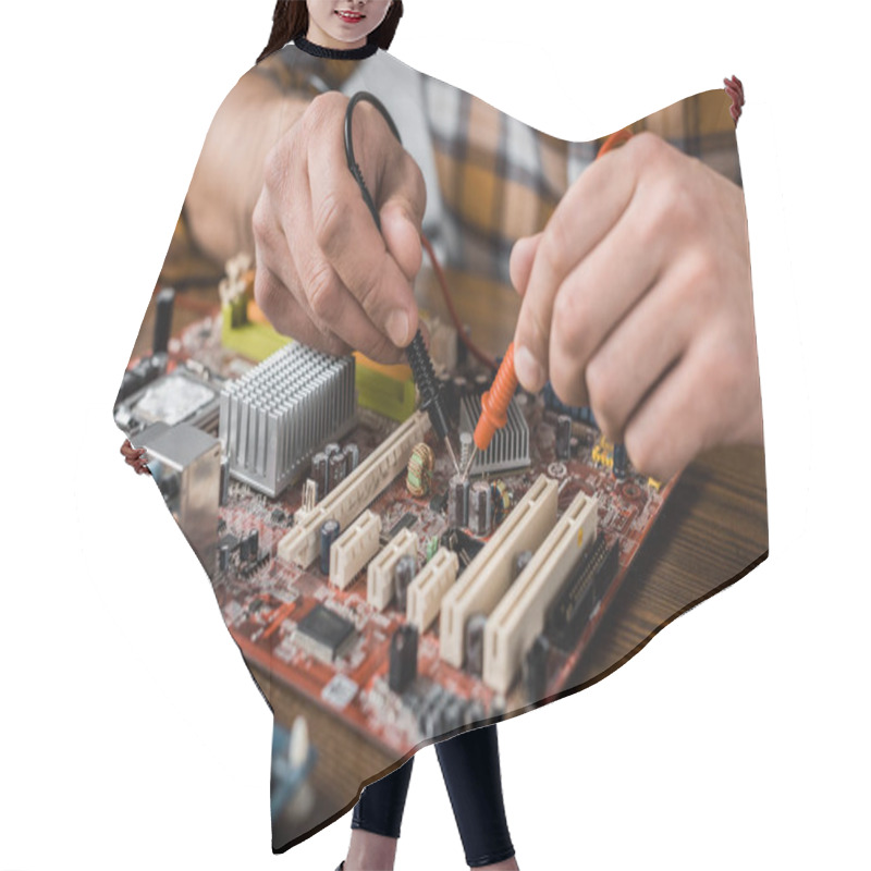 Personality  Cropped Shot Of Computer Engineer With Tester Examining Motherboard Hair Cutting Cape