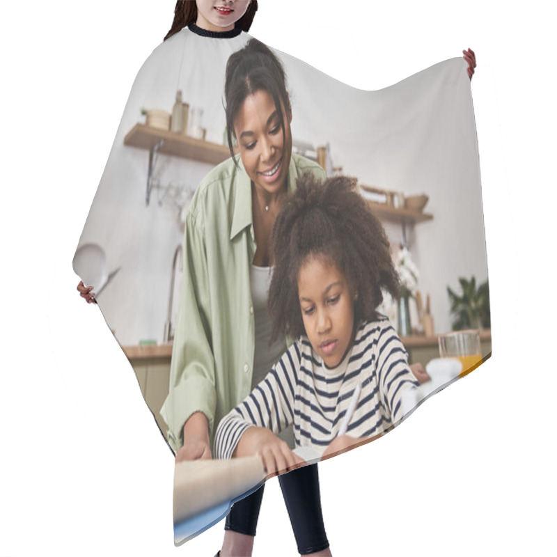 Personality  Mother And Daughter Share A Joyful Moment As They Explore Creativity Together At Home. Hair Cutting Cape