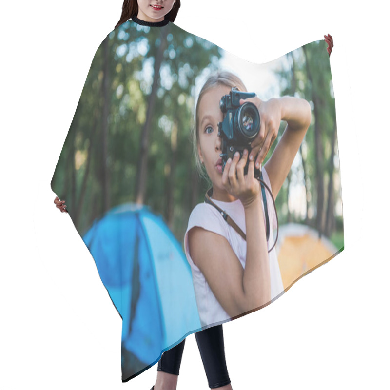 Personality  Surprised Kid Holding Digital Camera While Taking Photo Near Camps  Hair Cutting Cape