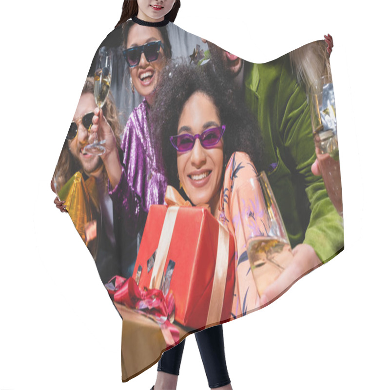 Personality  African American Woman In Sunglasses Holding Gift Boxes Among Interracial Friends Near Grey Curtain On Black Background Hair Cutting Cape