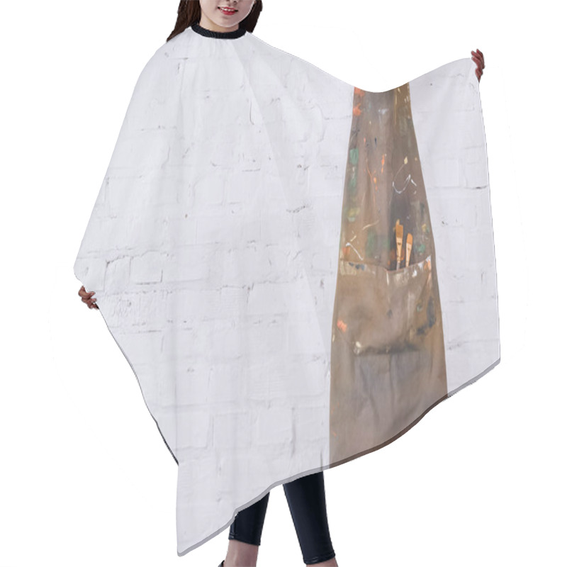 Personality  Brown Apron With Paint Brushes Hanging On White Brick Wall   Hair Cutting Cape