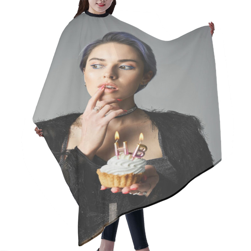 Personality  A Young Woman In Stylish Attire Holds A Cupcake With Lit Candles, A Birthday Girl Ready To Make A Wish. Hair Cutting Cape