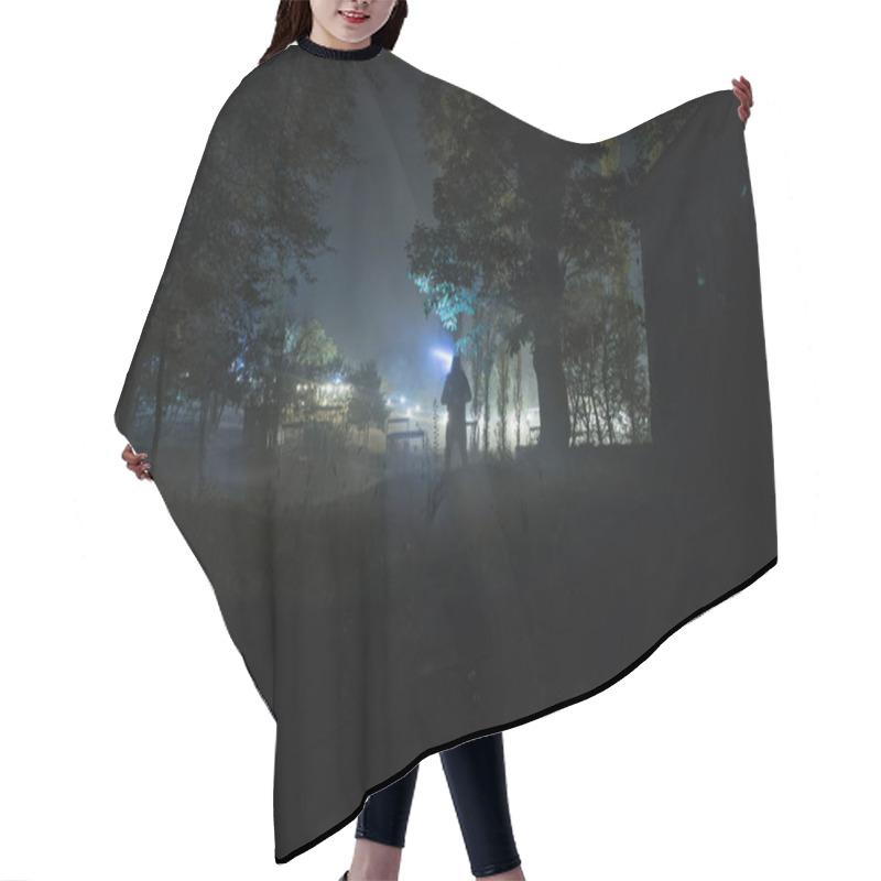 Personality  Silhouette Of Person Standing In The Dark Forest With Light. Horror Halloween Concept. Strange Silhouette In A Dark Spooky Forest At Night Hair Cutting Cape