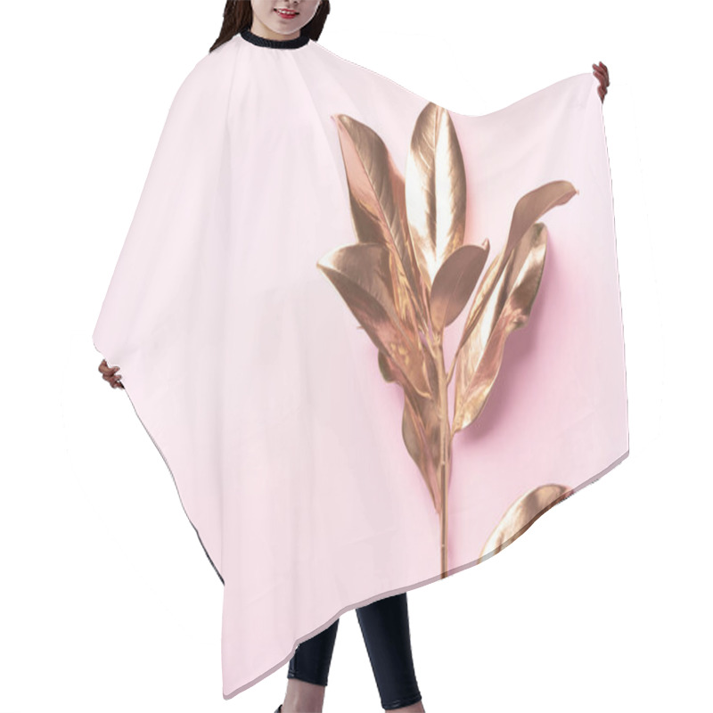 Personality  Floral Minimal Style Concept. Exotic Summer Trend. Golden Tropical Leaves And Branch On Pastel Pink Color Background. Shiny And Sparkle Design, Fashion Concept. Hair Cutting Cape