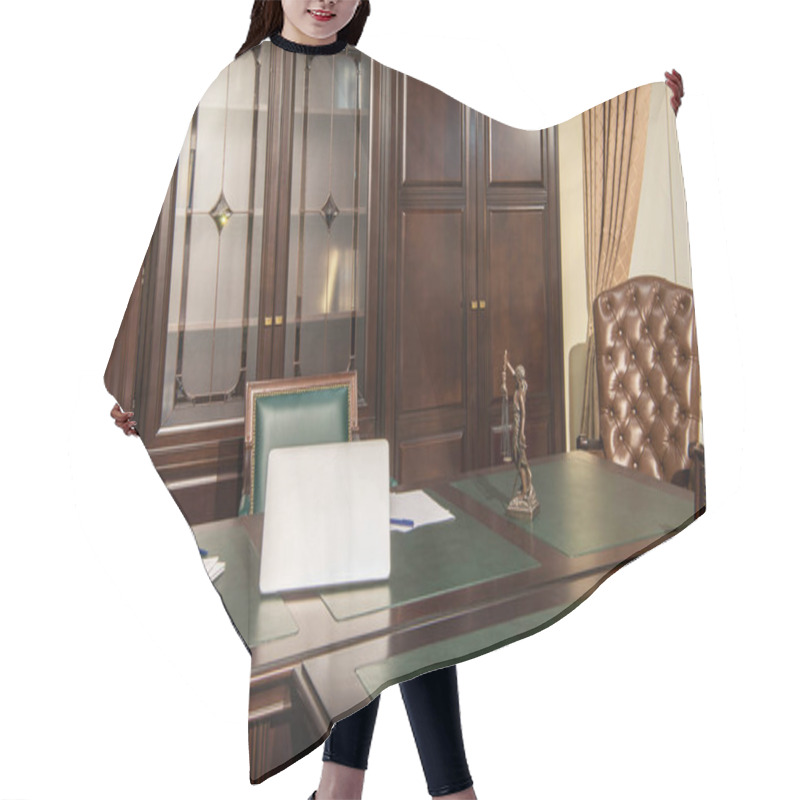 Personality  Interior Of Office Room With Laptop, Statuette And Papers On Table  Hair Cutting Cape