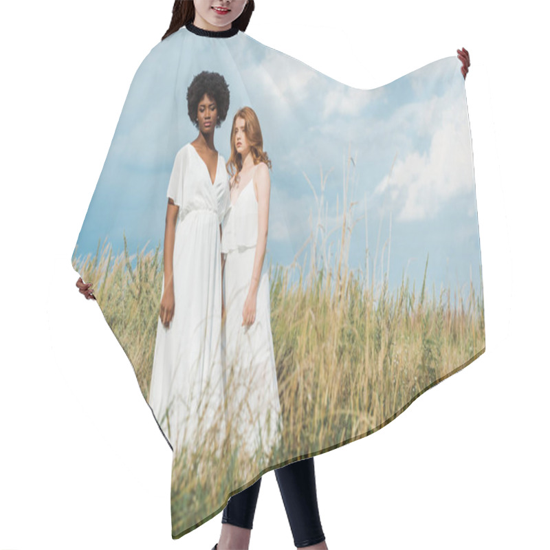 Personality  Young Attractive And Multicultural Women Standing In Field  Hair Cutting Cape