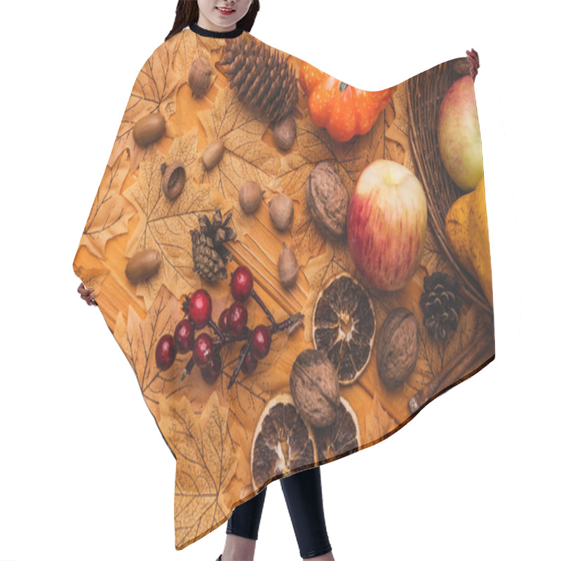 Personality  Top View Of Autumnal Decoration And Food Scattered From Wicker Basket On Golden Foliage On Wooden Background Hair Cutting Cape