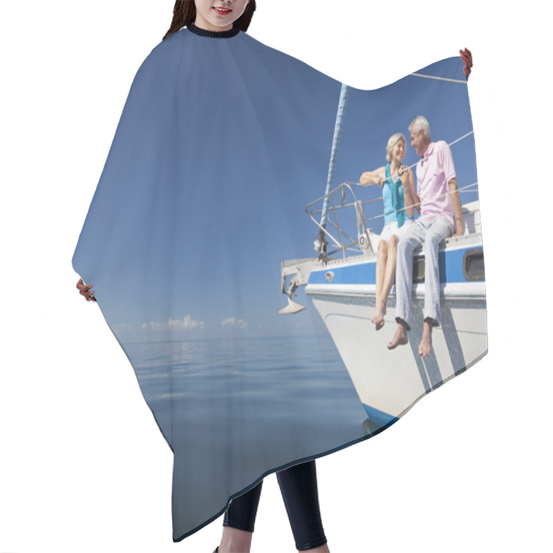 Personality  A Happy Senior Couple Sitting On The Front Of A Sail Boat Hair Cutting Cape