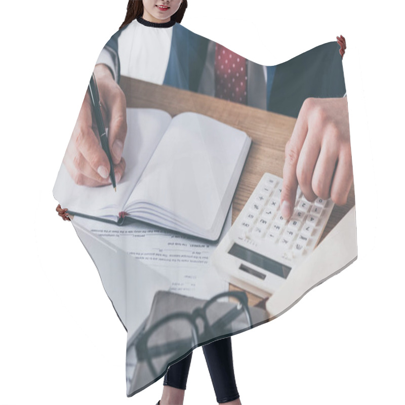 Personality  Cropped View Of Businessman In Formal Wear Using Calculator And Writing In Notebook Hair Cutting Cape