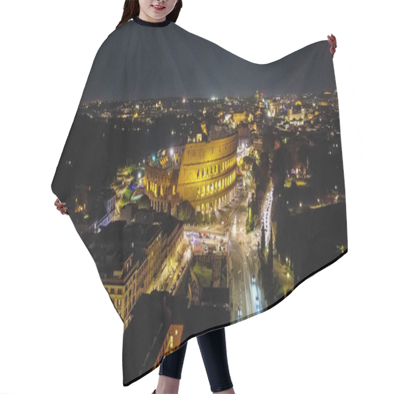 Personality  A Stunning Aerial View Of The Colosseum In Rome At Night, Beautifully Illuminated Against The Evening Sky. The Photo Captures The Grandeur Of This Iconic Ancient Monument In The Heart Of Rome Hair Cutting Cape