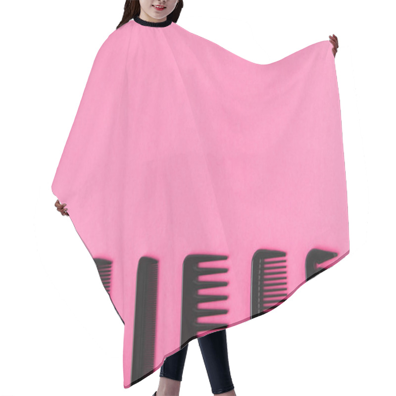 Personality  Top View Of Black Combs In Row, Isolated On Pink With Copy Space Hair Cutting Cape