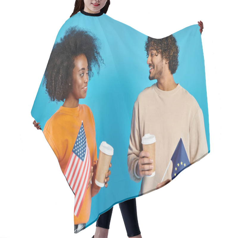 Personality  An Interracial Couple In Casual Attire Standing Together, Holding Coffee Cups And Flags Hair Cutting Cape