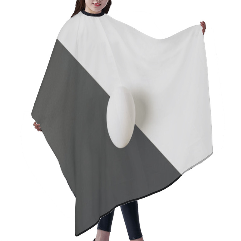 Personality  White Egg Laying In Middle Of Black And White Background  Hair Cutting Cape