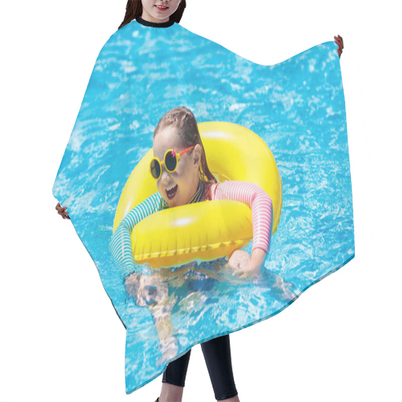 Personality  Child With Sunglasses In Swimming Pool. Little Girl On Inflatable Ring. Kid With Colorful Float. Kids Learn To Swim And Dive In Outdoor Pool Of Tropical Resort. Sun Protection And Eye Wear. Water Fun. Hair Cutting Cape