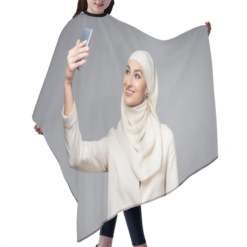 Personality  Beautiful Smiling Muslim Woman Taking Selfie With Smartphone Isolated On Grey   Hair Cutting Cape