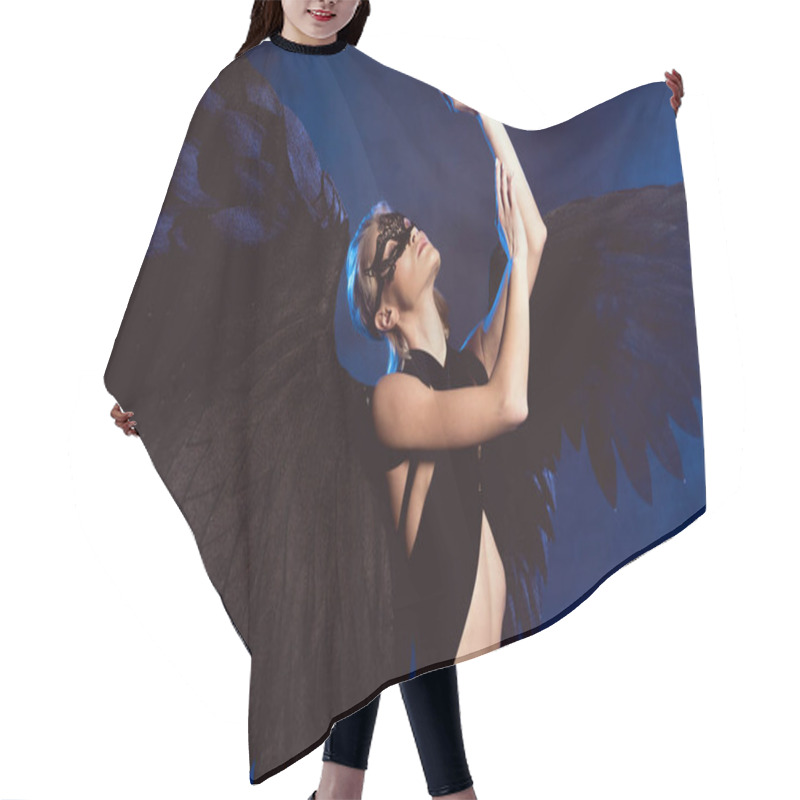 Personality  Beautiful Sexy Woman In Lace Mask And Black Angel Wings Gesturing With Hands While Posing On Dark Blue Background Hair Cutting Cape