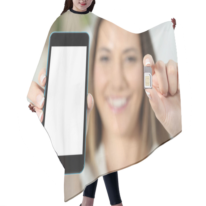 Personality  Close Up Of A Happy Woman Hand Showing A Sim Card And A Smart Phone Hair Cutting Cape