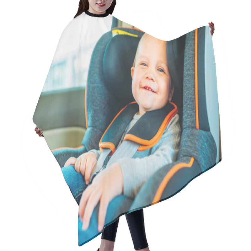 Personality  Happy Little Baby Sitting In Child Safety Seat In Car And Looking At Camera Hair Cutting Cape