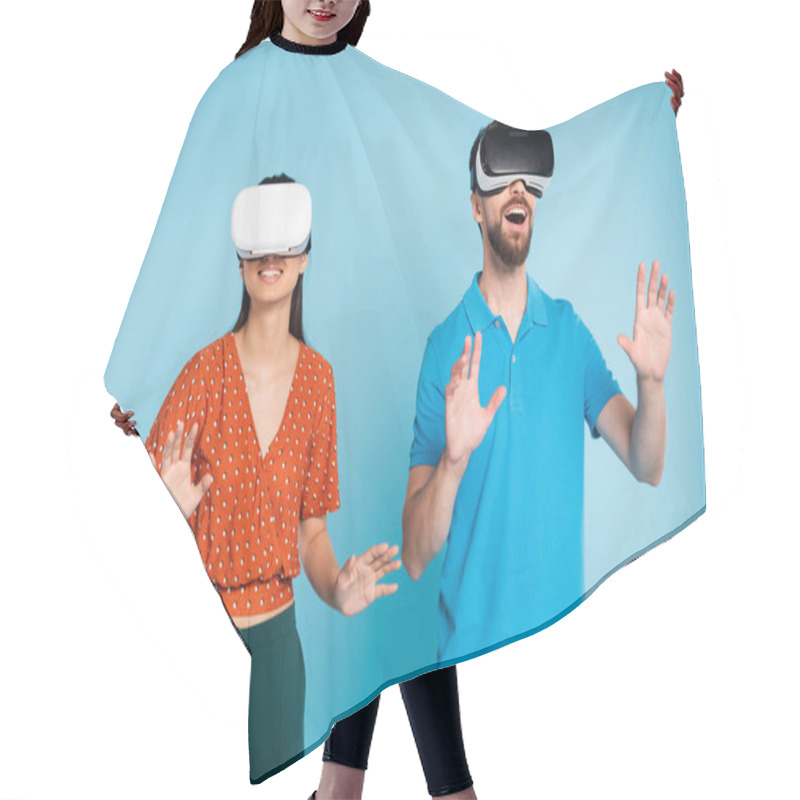 Personality  Excited Man In Polo T-shirt And Woman In Red Blouse Using Vr Headsets While Gesturing With Hands On Blue Hair Cutting Cape