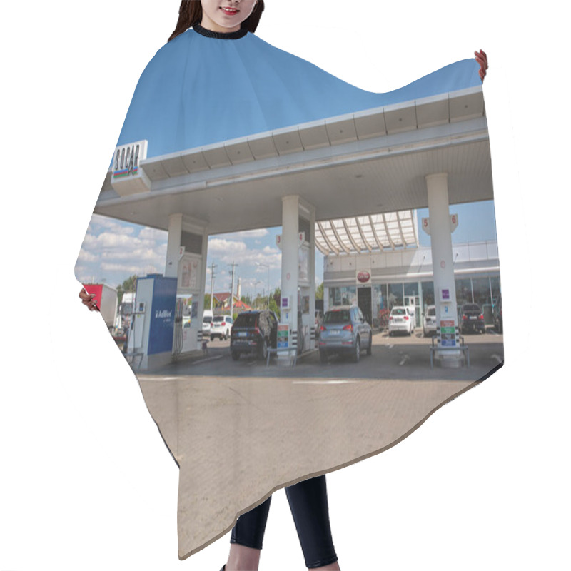 Personality  Bucharest, Romania - August 13, 2021: People Visit Socar Gas Station. SOCAR Is Fully State Owned National Oil And Gas Company Headquartered In Baku, Azerbaijan. Hair Cutting Cape