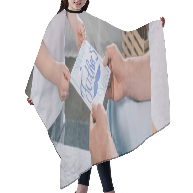 Personality  Panoramic Shot Of Son Gifting Fathers Day Greeting Card To Dad Hair Cutting Cape