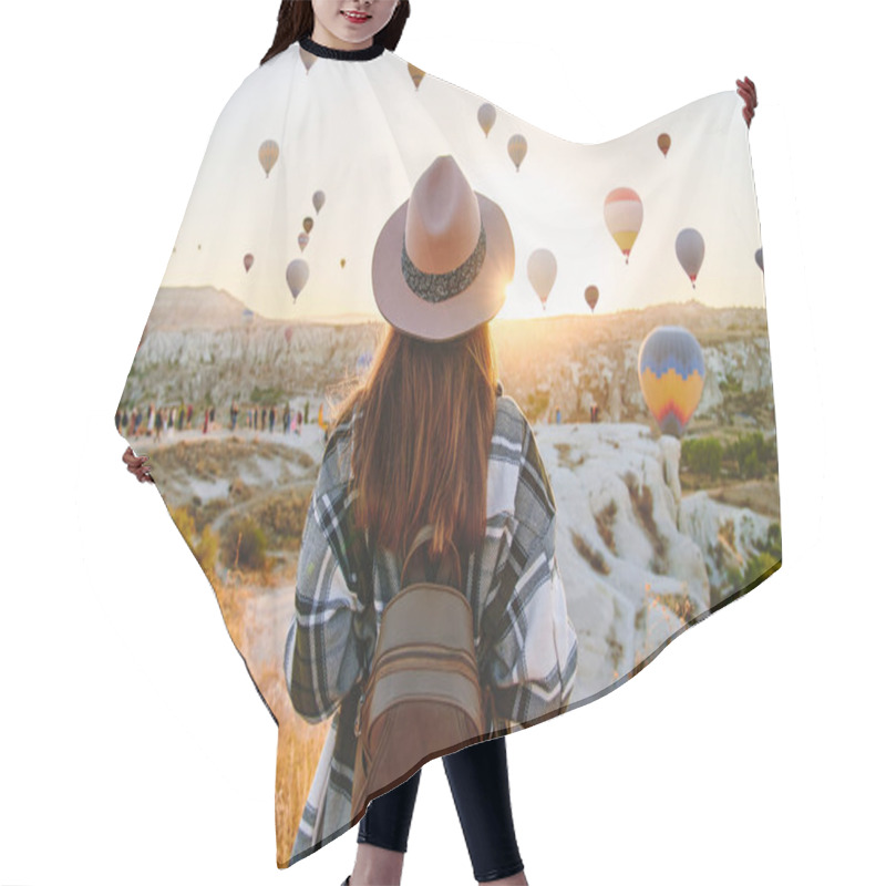 Personality  Girl Traveler Vacations At Beautiful Destination In Goreme, Turkey. Scenic Kapadokya With Flying Air Balloons At Sunrise, Anatolia Hair Cutting Cape