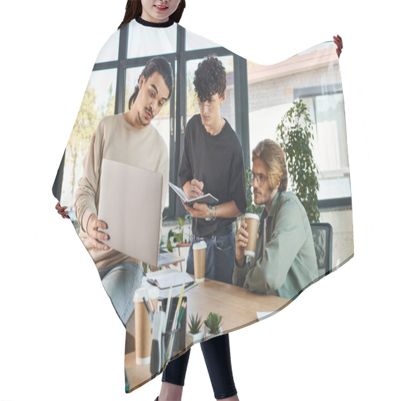 Personality  Young Man Presenting Ideas While Holding Laptop And Talking To Startup Team During Meeting Hair Cutting Cape