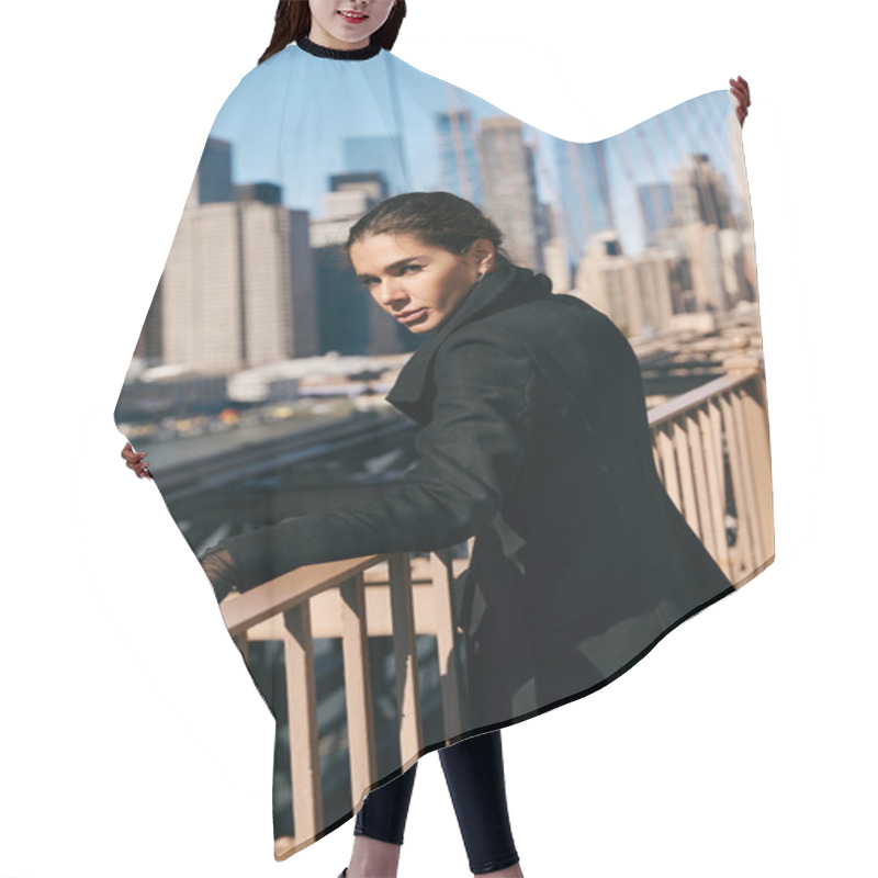 Personality  A Young Woman Pauses On A Bridge In New York City, Taking In The View. Hair Cutting Cape