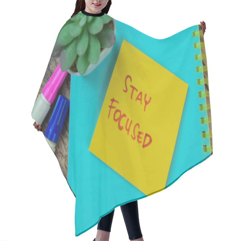 Personality  Concept Of Stay Focused Write On Sticky Notes Isolated On Wooden Table. Hair Cutting Cape