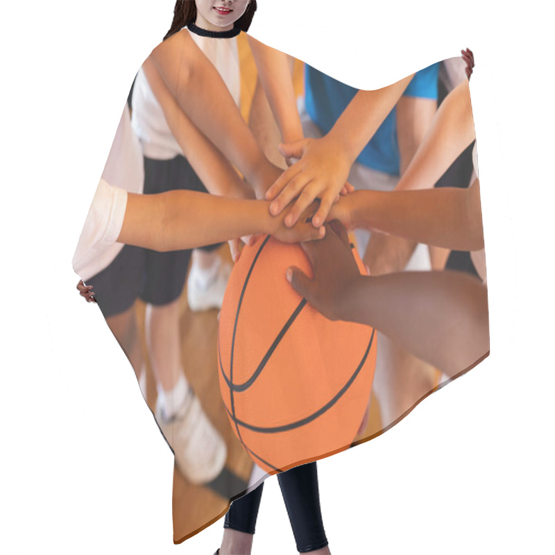 Personality  Close-up Of Schoolkids Forming Hand Stack On Basketball At Basketball Court In School Hair Cutting Cape