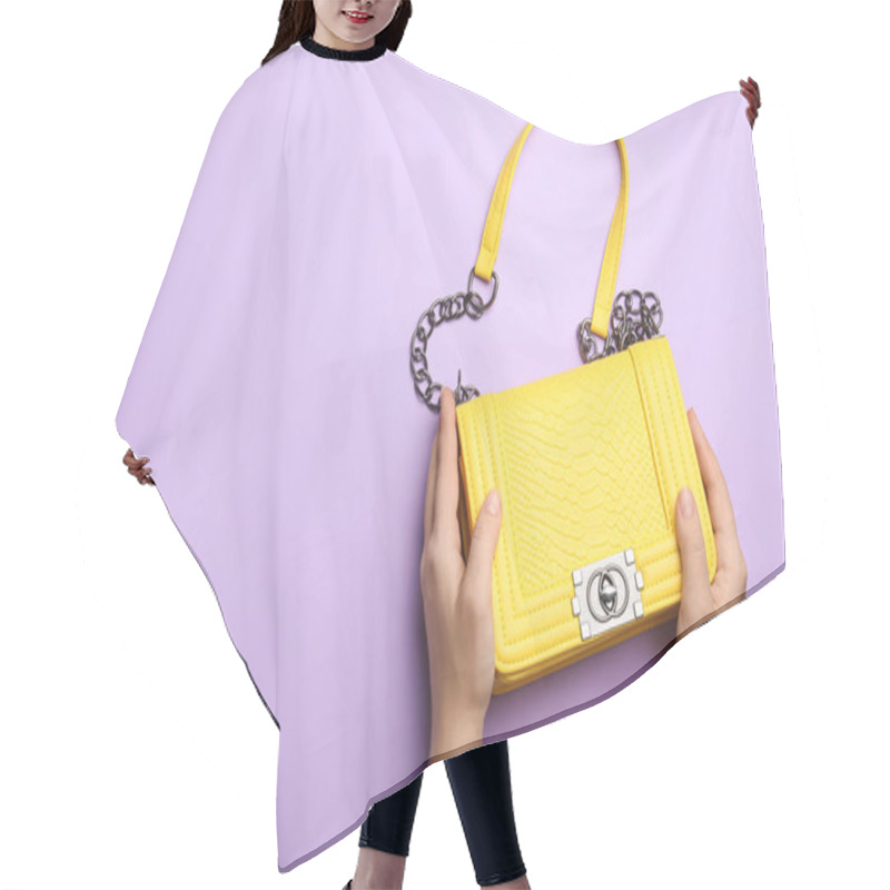 Personality  Woman Holding Small Bag On Lilac Background, Top View. Space For Text Hair Cutting Cape