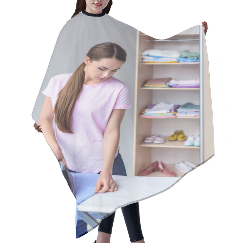 Personality  Attractive Young Woman Ironing Clothing At Home Hair Cutting Cape