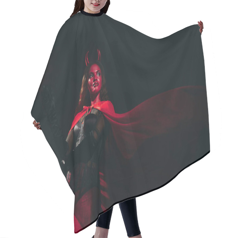 Personality  A Stunning Woman Dressed As A Devil Stands Confidently, Showcasing Her Elaborate Halloween Costume. Hair Cutting Cape