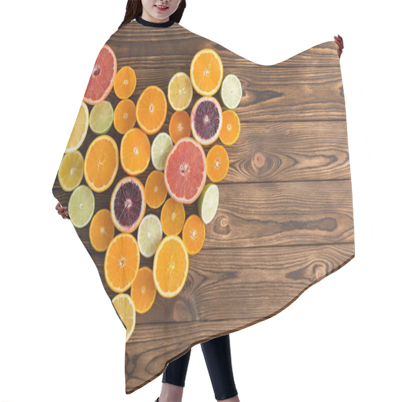 Personality  Overhead View Of Different Fresh Fruit Arranged In Shape Of Love Heart On Brown Wooden Background. Hair Cutting Cape