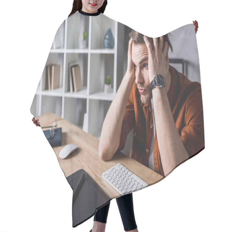 Personality  Bewildered Designer Sitting At Workplace And Holding Head With Hands Hair Cutting Cape