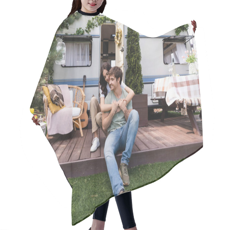 Personality  Smiling Woman Embracing Boyfriend On Terrace Near Camper Outdoors  Hair Cutting Cape