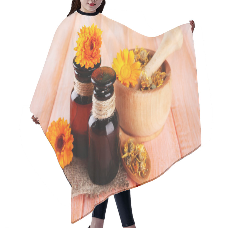 Personality  Medicine Bottles And Calendula Flowers On Wooden Background Hair Cutting Cape