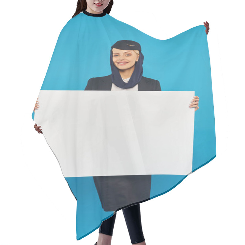 Personality  Happy Stewardess In Uniform Of Arabian Airlines Holding Blank Placard On Blue Studio Background Hair Cutting Cape