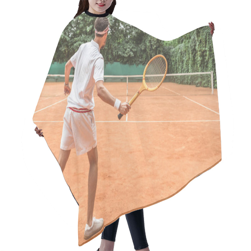 Personality  Back View Of Tennis Player With Retro Wooden Racket On Tennis Court Hair Cutting Cape