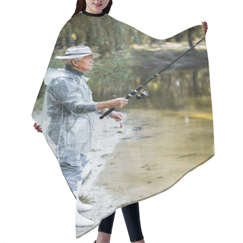 Personality  Side View Of Asian Man Fishing Near Lake In Autumn  Hair Cutting Cape