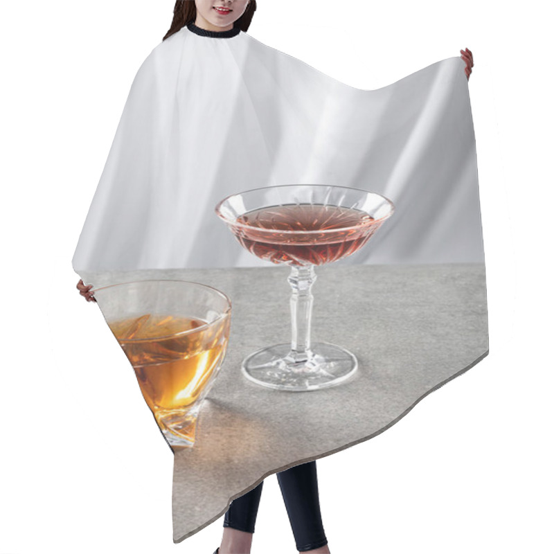 Personality  Red Wine Near Glass Of Strong Cognac On White  Hair Cutting Cape