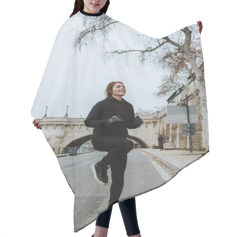 Personality  Young French Redhead Woman In Sports Outfit Stretching And Doing Exercises Outdoors In Winter Weather In European City Hair Cutting Cape