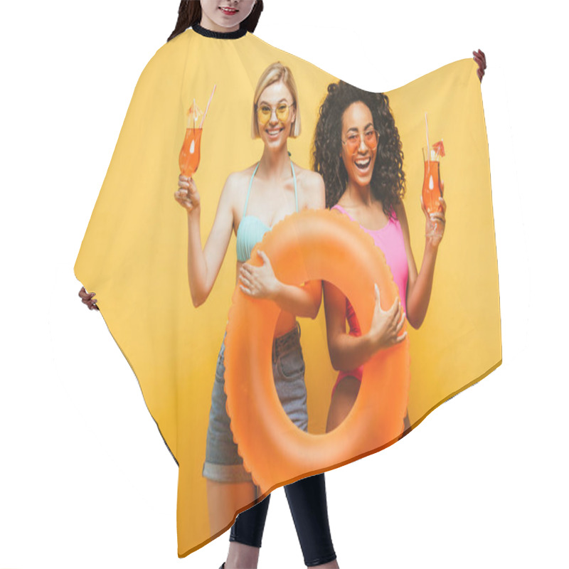 Personality  Young Interracial Women In Summer Outfit Holding Swim Ring And Cocktail Glasses On Yellow Hair Cutting Cape